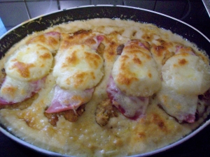 Pineapple and ham steak topped with melted cheese