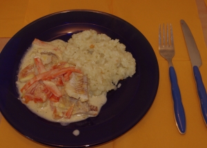 Fish with cream sauce and rice