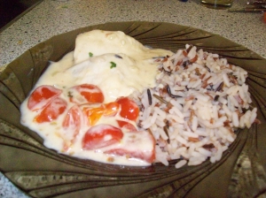 Tilapia with lemon basil sauce and date tomatoes at three colored rice