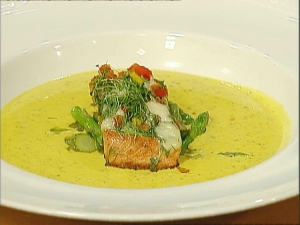 Fine mustard soup with sauteed asparagus salad and au gratin Salmon Trout