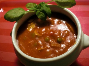 Tomato soup with peas and ham