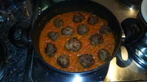 Hot 39n Spicy Fried Meatballs In Tomato Sauce On Canary Pepper Rice Pilaf