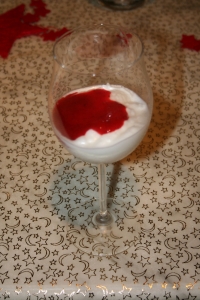 Lemon Prosecco sorbet with strawberry sauce