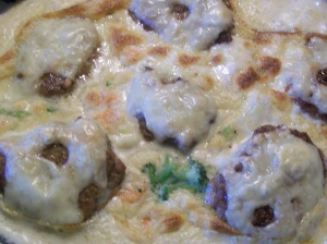 Meatballs with vegetables and cream sauce baked recipe