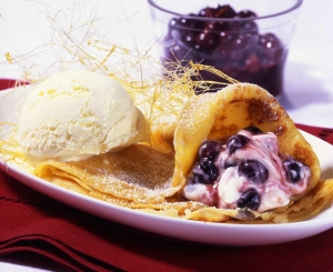 Blueberry pancakes with vanilla ice cream and angel hair
