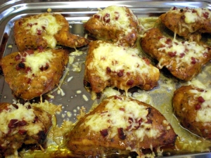 Chilimarinated turkey breast steak with ham and cheese dome