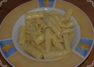 Macaroni with cheese sauce