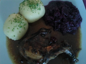 marinated rabbit with red cabbage and dumplings