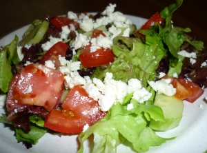 Iceberg tomato salad with sesame oil and white wine vinegar dressing