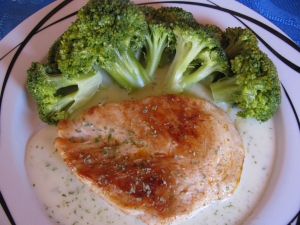 Chicken breast with broccoli cheese sauce