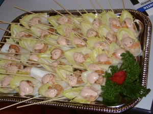 Chicory and shrimp with cocktail sauce boat