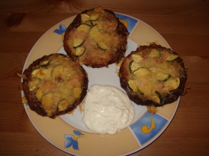 Potato pancakes baked zucchini with cheese and ham