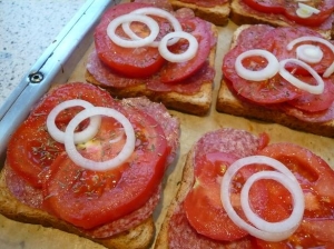 Salami and tomato toast with cheese