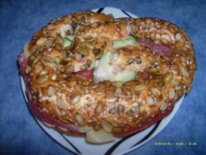 Scion pretzel with cheese and paprika salami