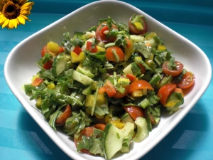 Salad Of Arugula Peppers Cherry Tomatoes And Cucumber